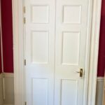 New non-fire-rated inner library door-set, matched to the existing joinery, from the library side
