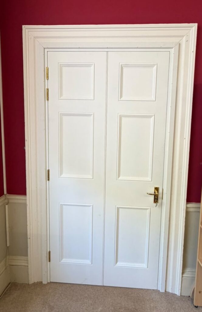 New non-fire-rated inner library door-set, matched to the existing joinery, from the library side